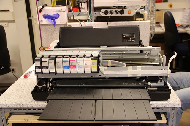 An opened digital printer for checking inks.